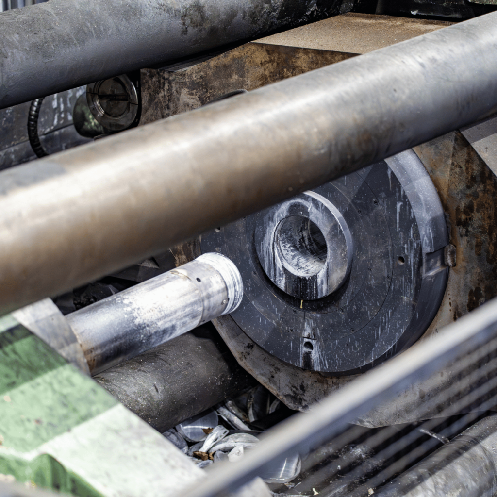 Close-up of machinery and extrusion die equipment in a BOAL aluminium production plant