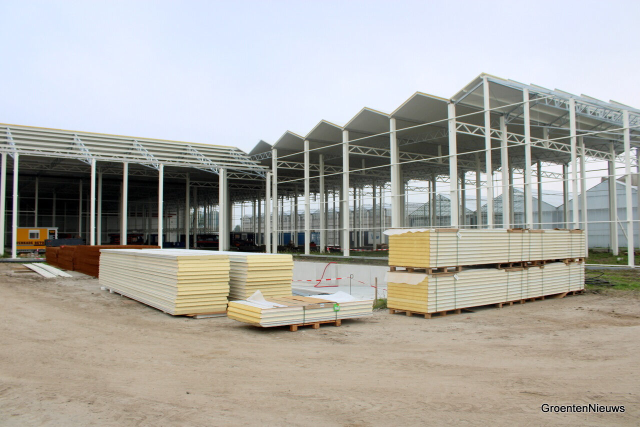 Steel framework and building materials at Iribov’s new greenhouse construction site in Heerhugowaard